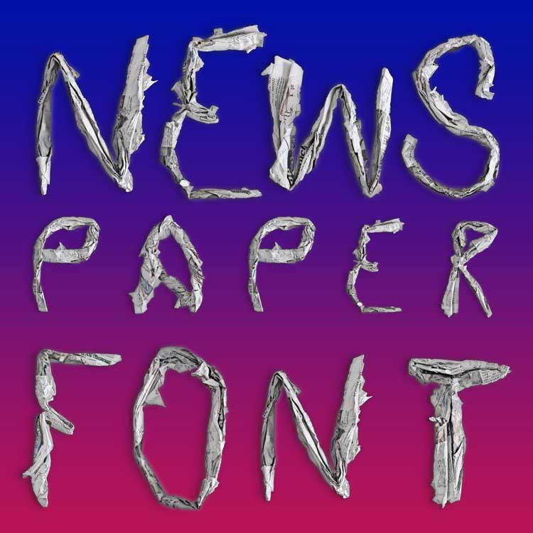 the words 'Newspaper Type' layed out in rolled newspaper